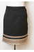 Черная юбка с коричневым орнаментом