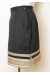 Черная юбка с коричневым орнаментом