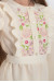 Платье для девочки «Шелест цветов» молочного цвета с многоцветным орнаментом