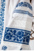Вышиванка для девочки «Кружевные цветы» белого цвета с синей вышивкой