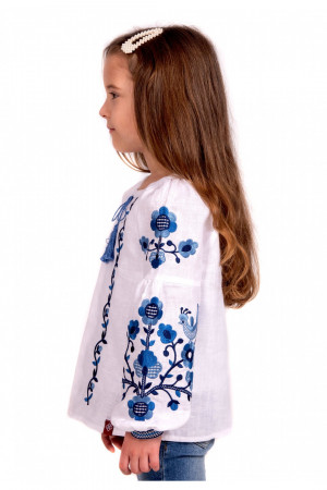 Вишиванка для дівчинки «Юстинка» білого кольору з синьо-блакитною вишивкою