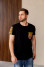 Black "Determination" T-shirt with orange ornament