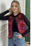 Cherry-colored velvet vest
