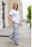 White "Bonjour" suit with reptile print