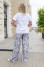White "Bonjour" suit with reptile print