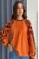 "Candice" blouse in a terrorist color with a print