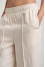 Брюки «Стимул» молочного кольору