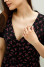 "Jocelyn" black dress with print