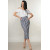Holly-Olivia costume: white blouse and gray striped skirt