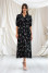 "Domian" dress in black with print