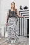 "Roxana" dress in black with newspaper print