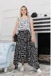 "Roxana" dress in white with newspaper print
