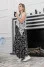 "Roxana" dress in white with newspaper print