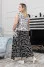 "Roxana" dress in white with newspaper print